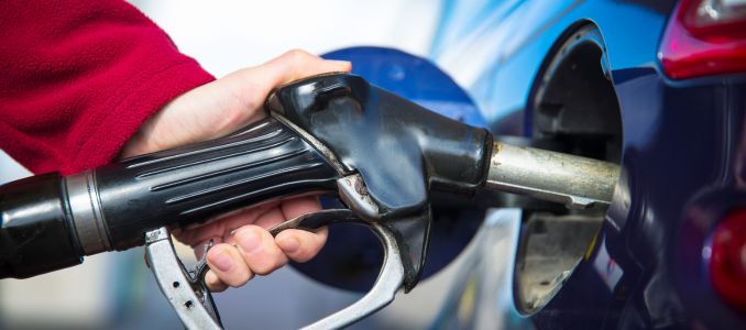 Person Pumping Gasoline